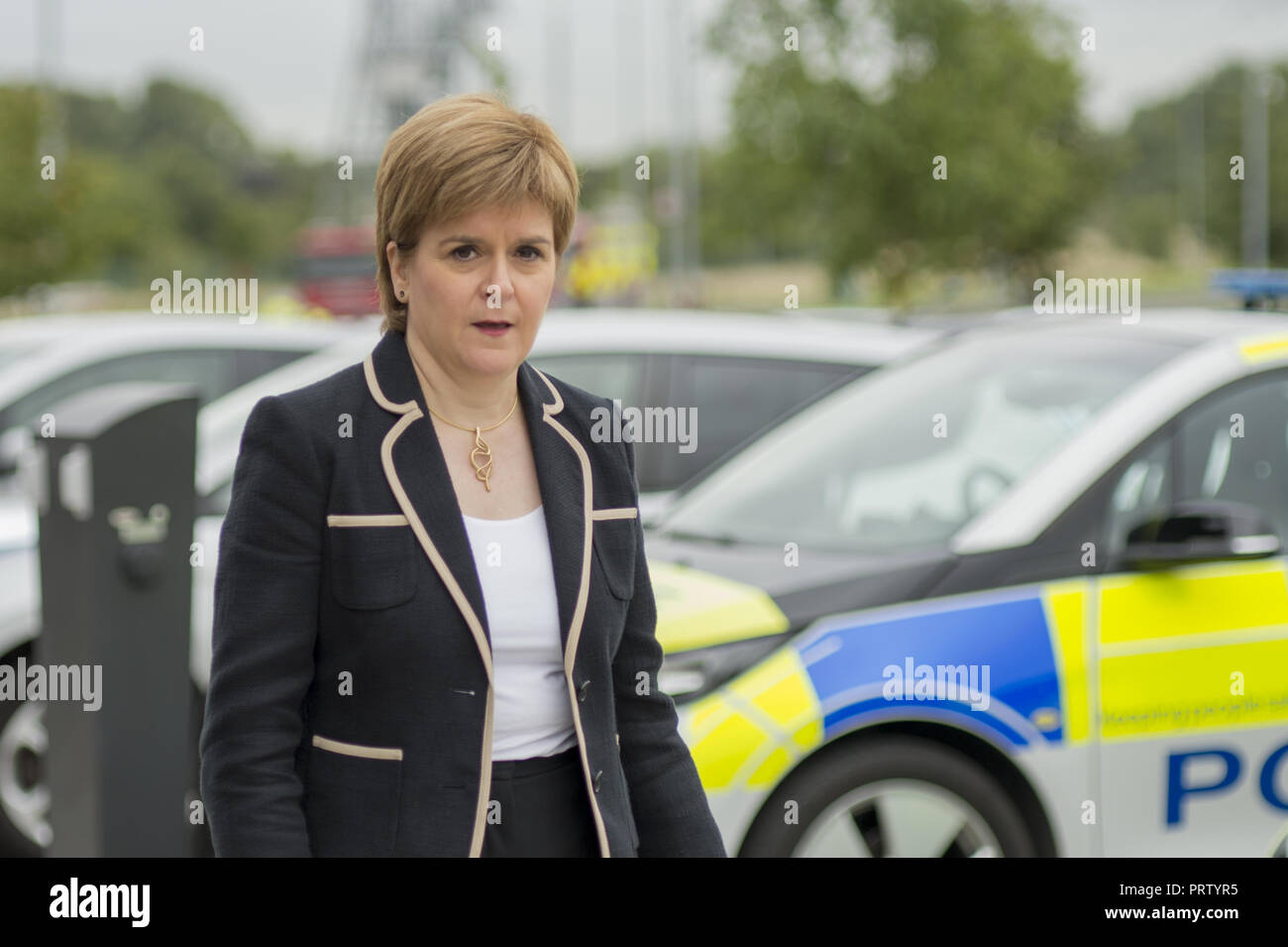 Scottish First Minister views a selection of electric vehicles from the