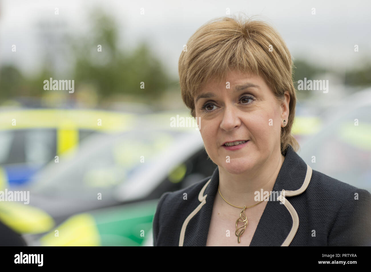 Scottish First Minister views a selection of electric vehicles from the