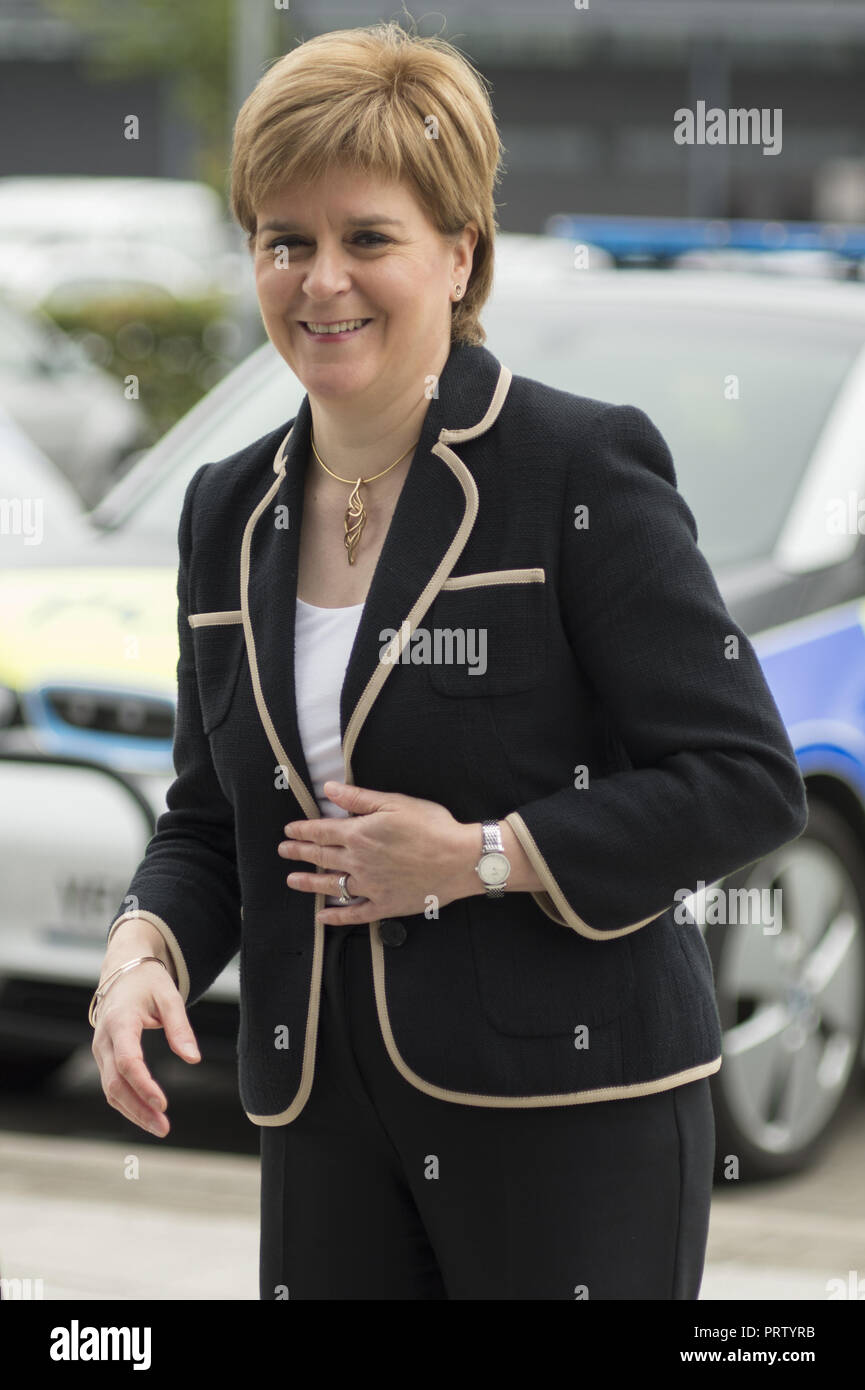 Scottish First Minister views a selection of electric vehicles from the