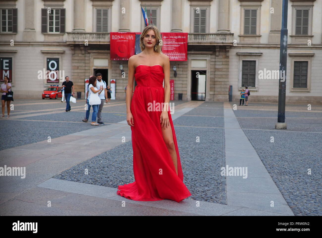 MILANO, Italy: September 21, 2018: Model posing for photographers in Duomo square after ACT 1 fashion show during MFW Stock Photo