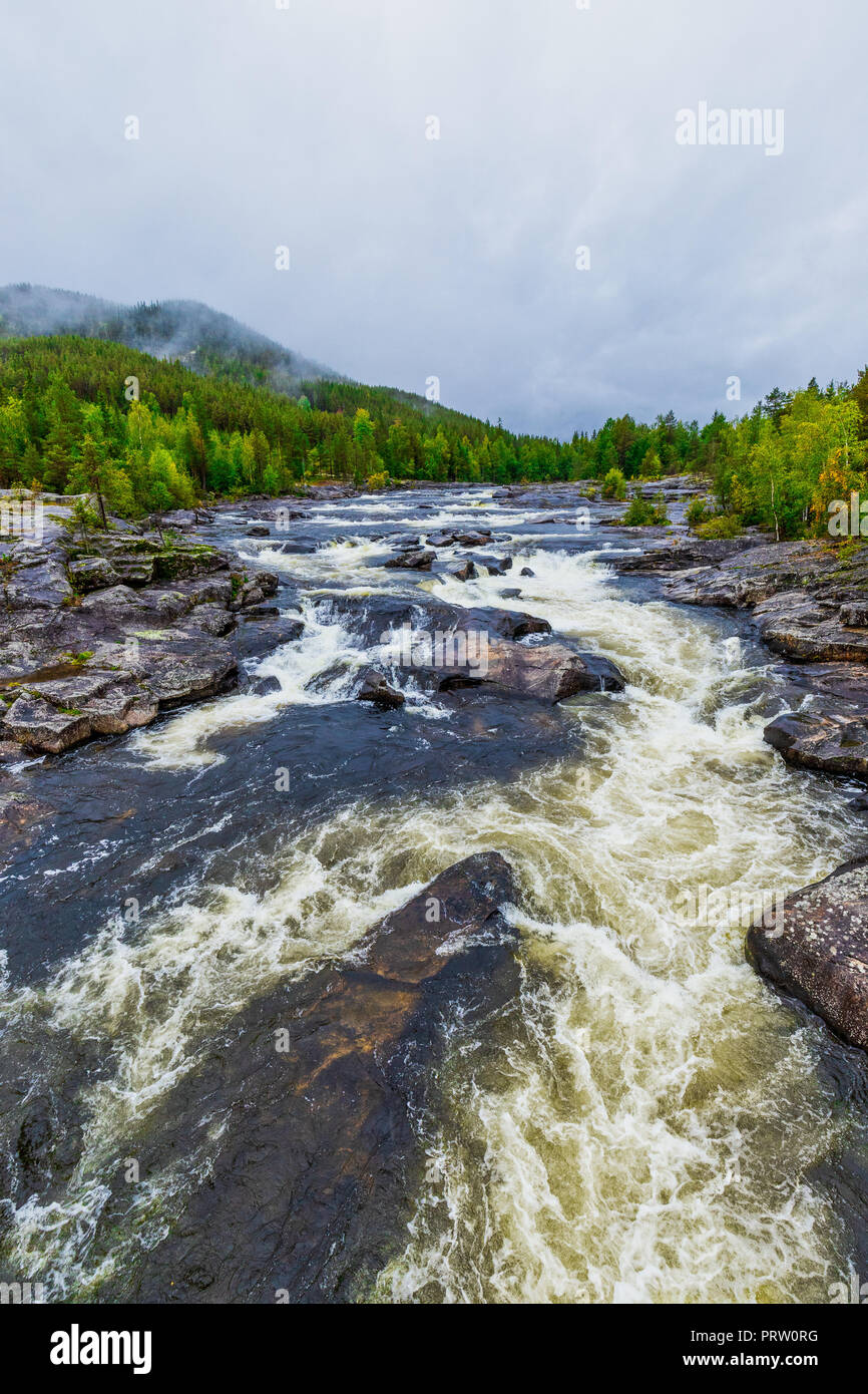 Halingdal river. A wild an natural river in Norway. The wild water is flowing through the rocks. The river is located between Oslo and Bergen. Stock Photo