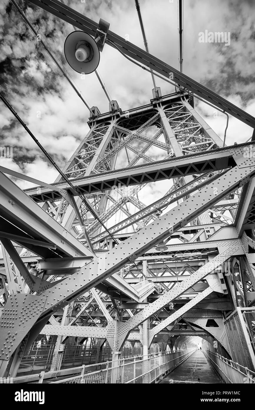 Black and white picture of the Williamsburg Bridge, connecting the Lower East Side of Manhattan with Brooklyn, New York, USA. Stock Photo
