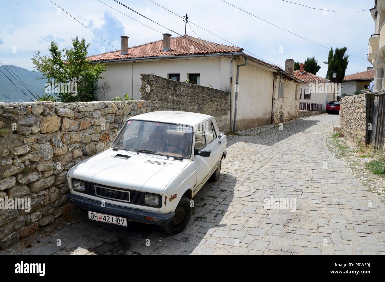 an old yugo car parked in ohrid macedonia Stock Photo