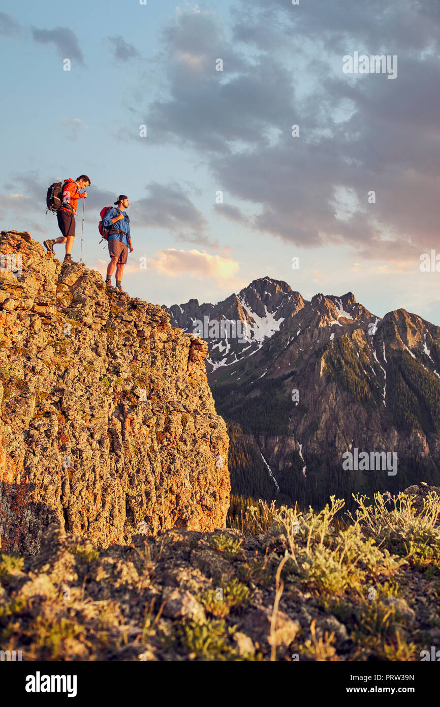 Hikers on mountain peak, Mount Sneffels, Ouray, Colorado, USA Stock Photo