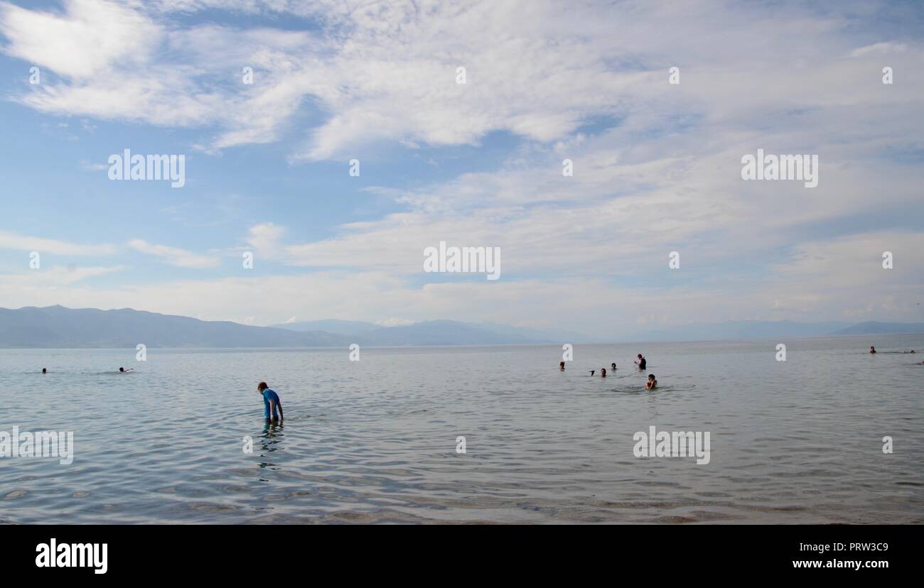 people enjoy the fresh water lake of ohrid at st naum macedonia Stock Photo