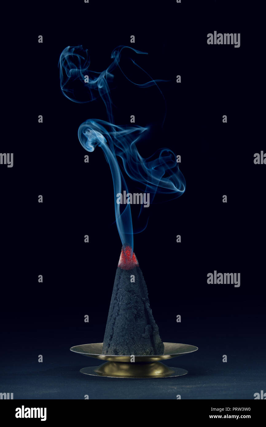 Incense scented smoke cone burning hires stock photography and images