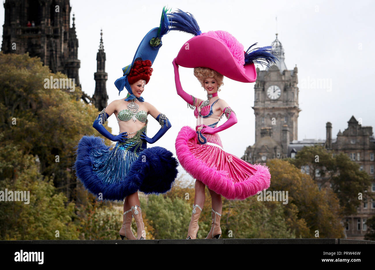Mathilde Tutiaux (left) and Lucy Monaghan, can-can dancers from the Moulin Rouge in Paris, perform at opening of the new exhibition 'Pin-Ups: Toulouse-Lautrec and the Art of Celebrity' at the Royal Scottish Academy in Edinburgh. Stock Photo