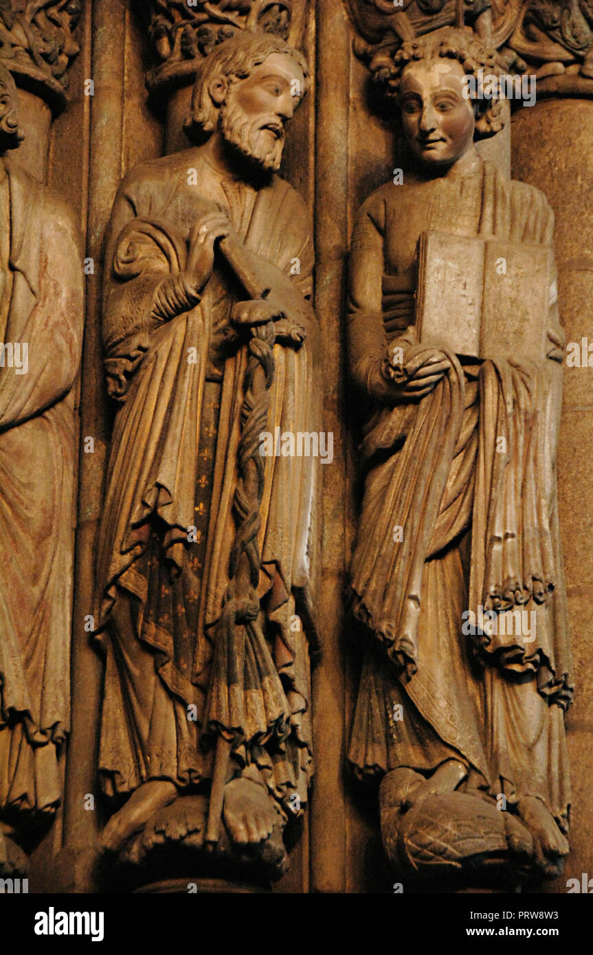 Santiago de Compostela, province of La Coruna, Galicia, Spain. The Cathedral. The Portal of Glory, by Master Mateo, 1168-1188. Left jamb. Four Apostles: detail of James and John the Evangelist (from left to right). Sculptoric detail. Stock Photo
