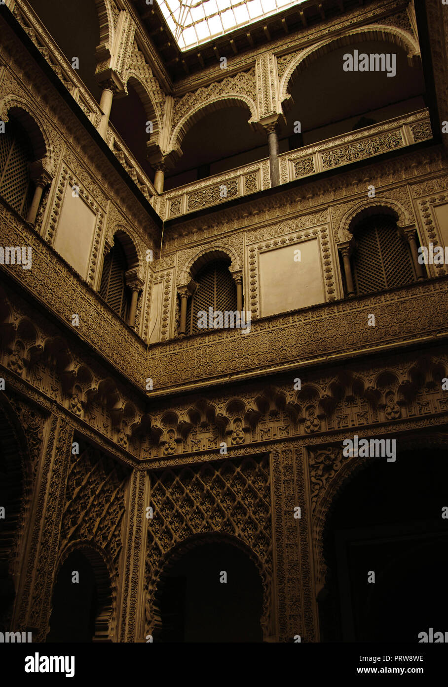 Spain. Andalusia. Seville. The Alcazar of Seville (Royal Alcazars). Dolls Courtyard, architectural detail. Mudejar style. It was designed to organise the rooms of the Palace private area, 14th century, and renovated between 1847 and 1855. Stock Photo