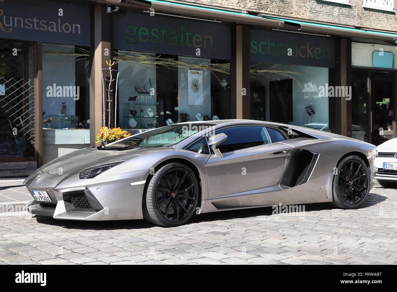 NUREMBERG, GERMANY - MAY 6, 2018: Lamborghini Aventador luxury sports car parked in Germany. The car was designed by Filippo Perini. Stock Photo