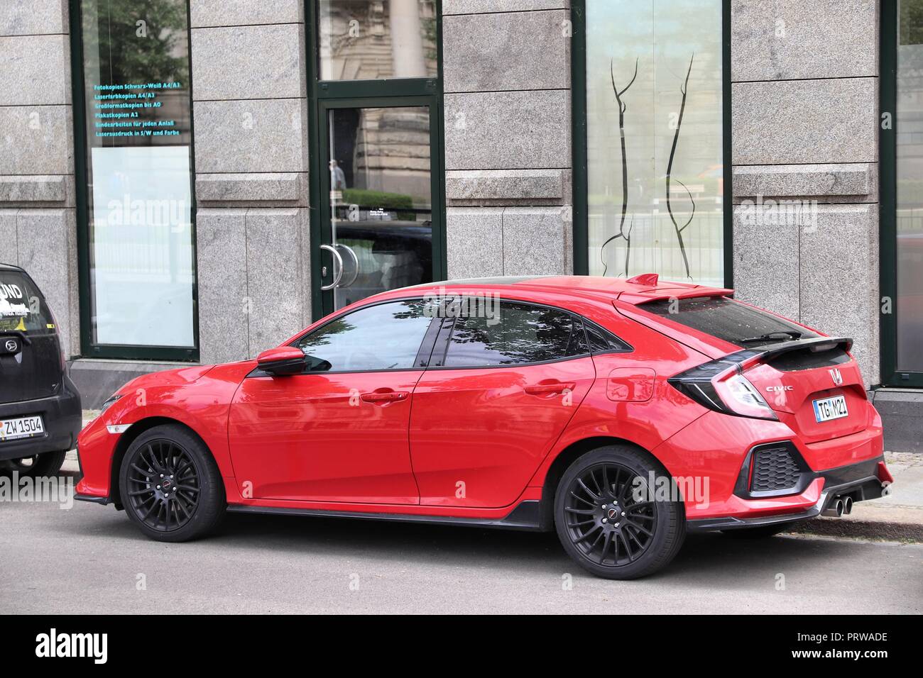 LEIPZIG, GERMANY - MAY 9, 2018: Red Honda Civic compact car in Germany. There were 45.8 million cars registered in Germany (as of 2017). Stock Photo