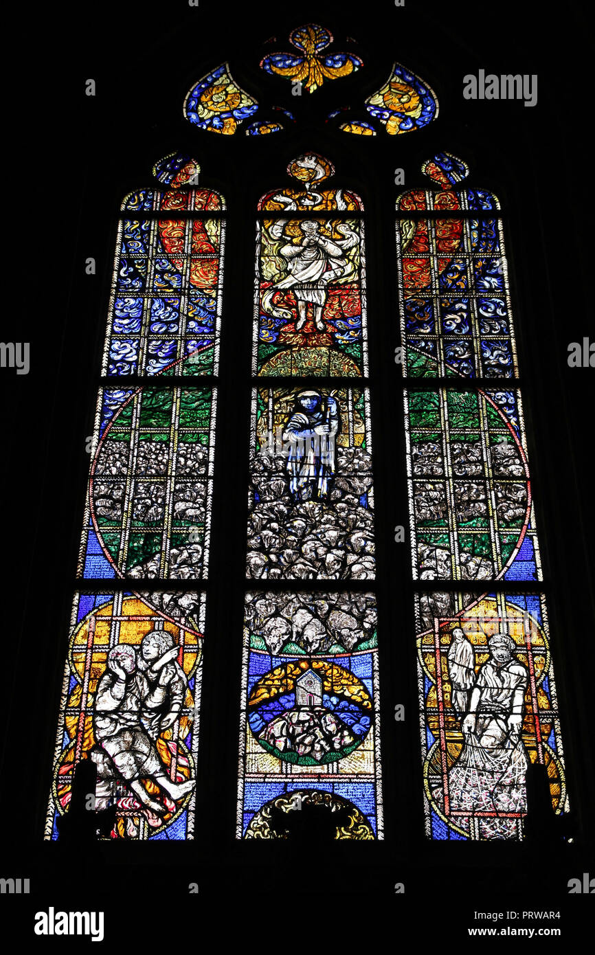 Stained glass art in Konstanz Cathedral - religious landmark of Germany Stock Photo