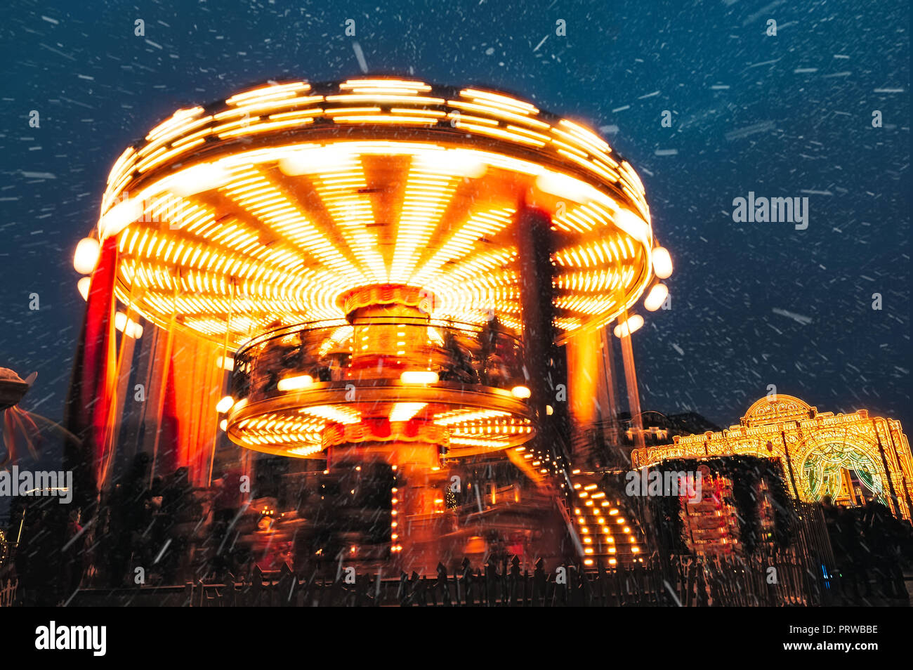 People on carousel near Red Square decorated and arranged for Christmas