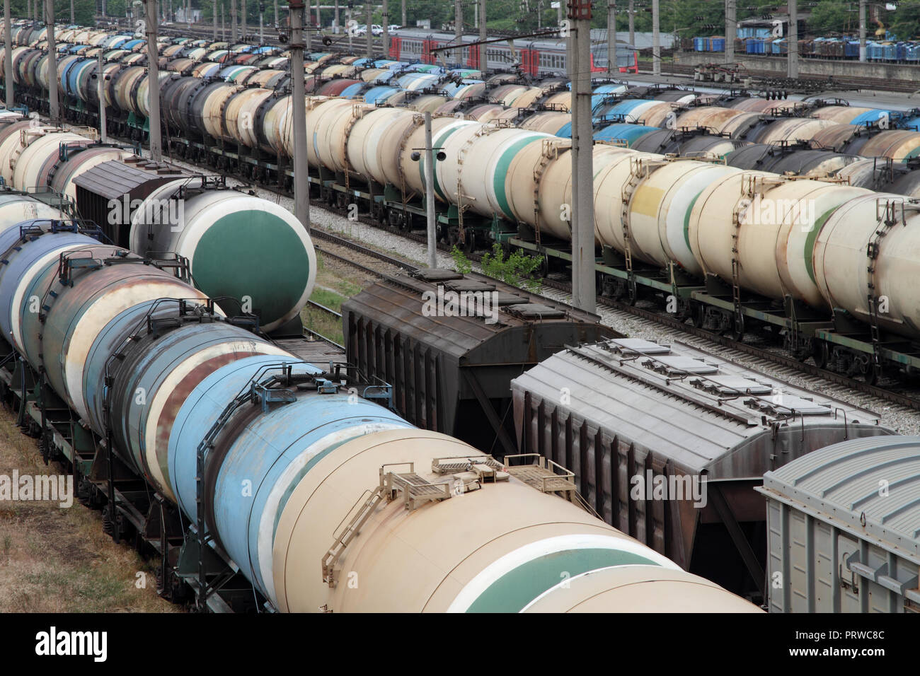 Tanks for the transportation of oil are on the railroad tracks. Stock Photo