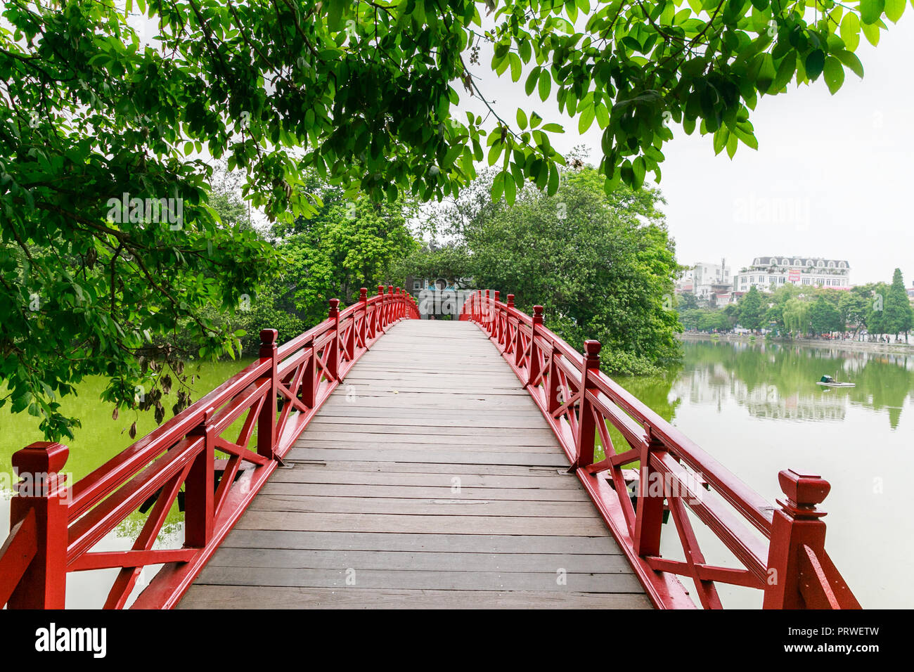 Red Bridge- The Huc Bridge in Hoan Kiem Lake, Hanoi, Vietnam Stock Photo