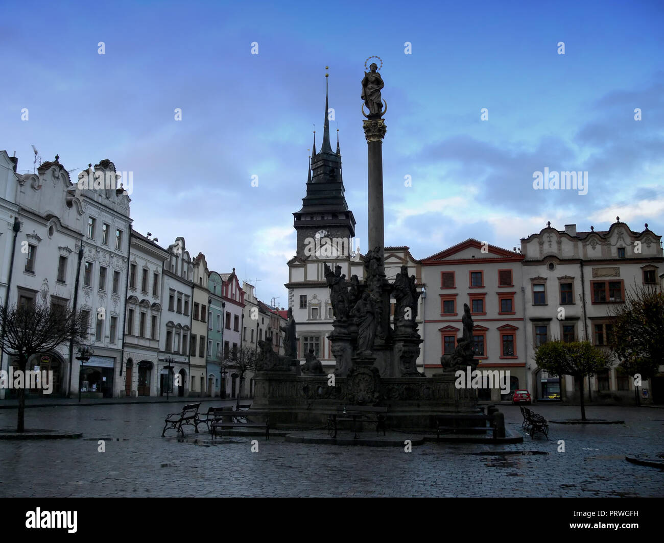 Pardubice, East Bohemia, Czech republic - the old town square with town hall, green tower and baroque houses facades Stock Photo