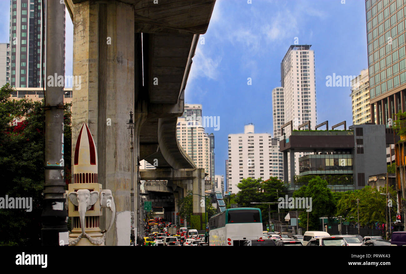 Skyscrapers and the viaduct of the sky train in the city centre of Bangkok (Krung Thep), Thailand, Asia. Asian street scene. Stock Photo