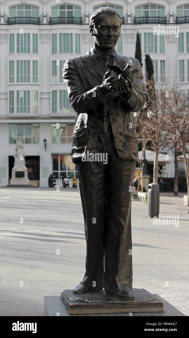 Statue of the famous poet, Federico García Lorca with a pigeon on Saint Anne Square (Plaza de Santa Ana) in the old town of Madrid, Spain, Europe. Stock Photo