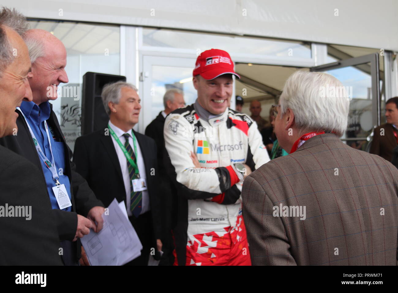 Deeside Rally Village, Wales UK  Thursday 04 October 2018,  Dafydd Elis-Thomas unveils a rally car Deeside Rally Village, Wales  Credit: Mike Clarke/Alamy Live News Stock Photo