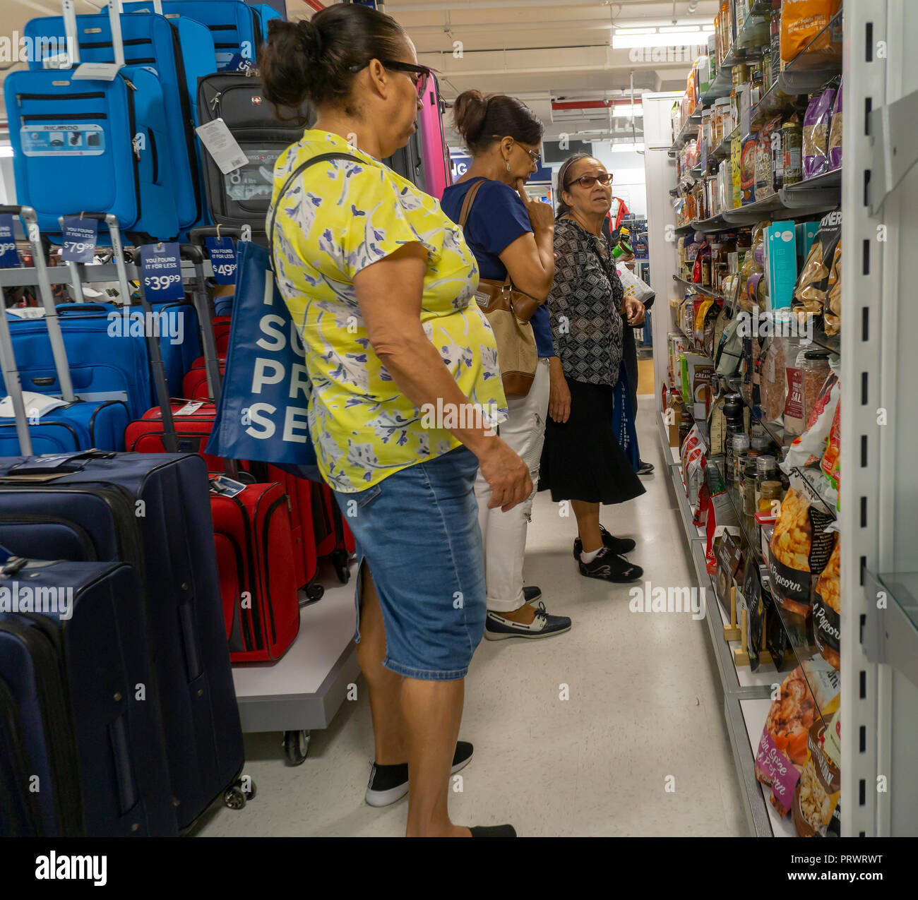 New York, USA. 4th October, 2018. Customers in the brand new off-price Marshalls store in the Lower East Side neighborhood of in New York during it's grand opening on Thursday, October 4, 2018. Marshalls is a brand of the TJX Companies, parent of Marshalls, T. J. Maxx, HomeGoods and other brands. TJX Companies recently reported comps that grew 6% over year citing increased traffic in its Marmaxx division (Marshalls, TX Maxx). (Â© Richard B. Levine) Credit: Richard Levine/Alamy Live News Stock Photo