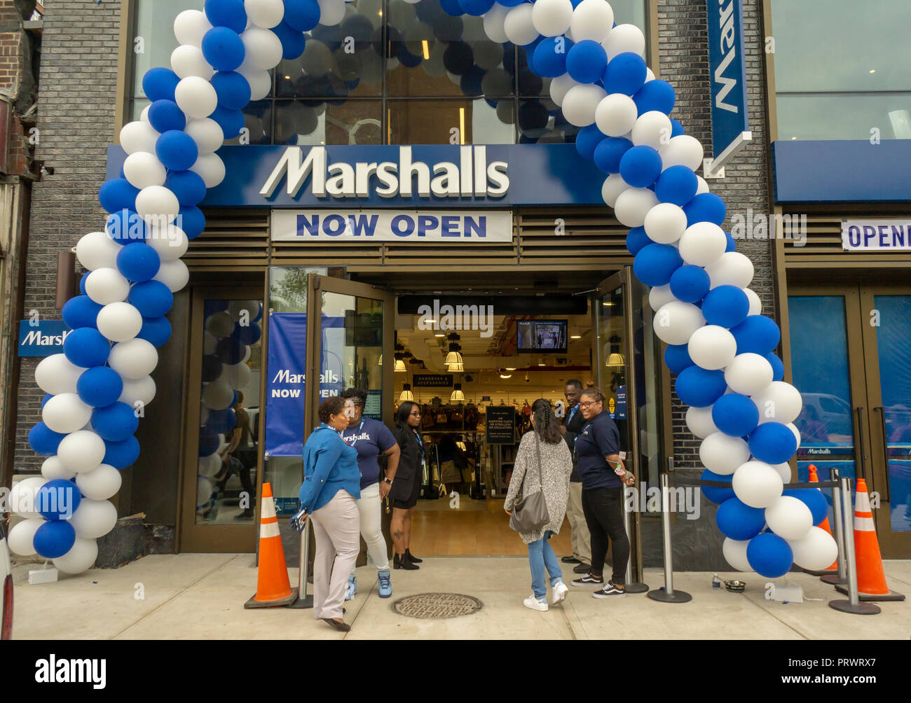 New York, USA. 4th October, 2018. Customers outside the brand new off-price Marshalls store in the Lower East Side neighborhood of in New York during it's grand opening on Thursday, October 4, 2018. Marshalls is a brand of the TJX Companies, parent of Marshalls, T. J. Maxx, HomeGoods and other brands. TJX Companies recently reported comps that grew 6% over year citing increased traffic in its Marmaxx division (Marshalls, TX Maxx). (Â© Richard B. Levine) Credit: Richard Levine/Alamy Live News Stock Photo