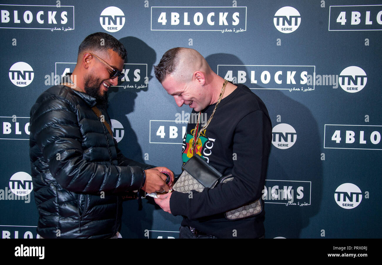 04 October 2018, Berlin The rappers LX (r) and Gringo (l) on the red carpet for the premiere of
