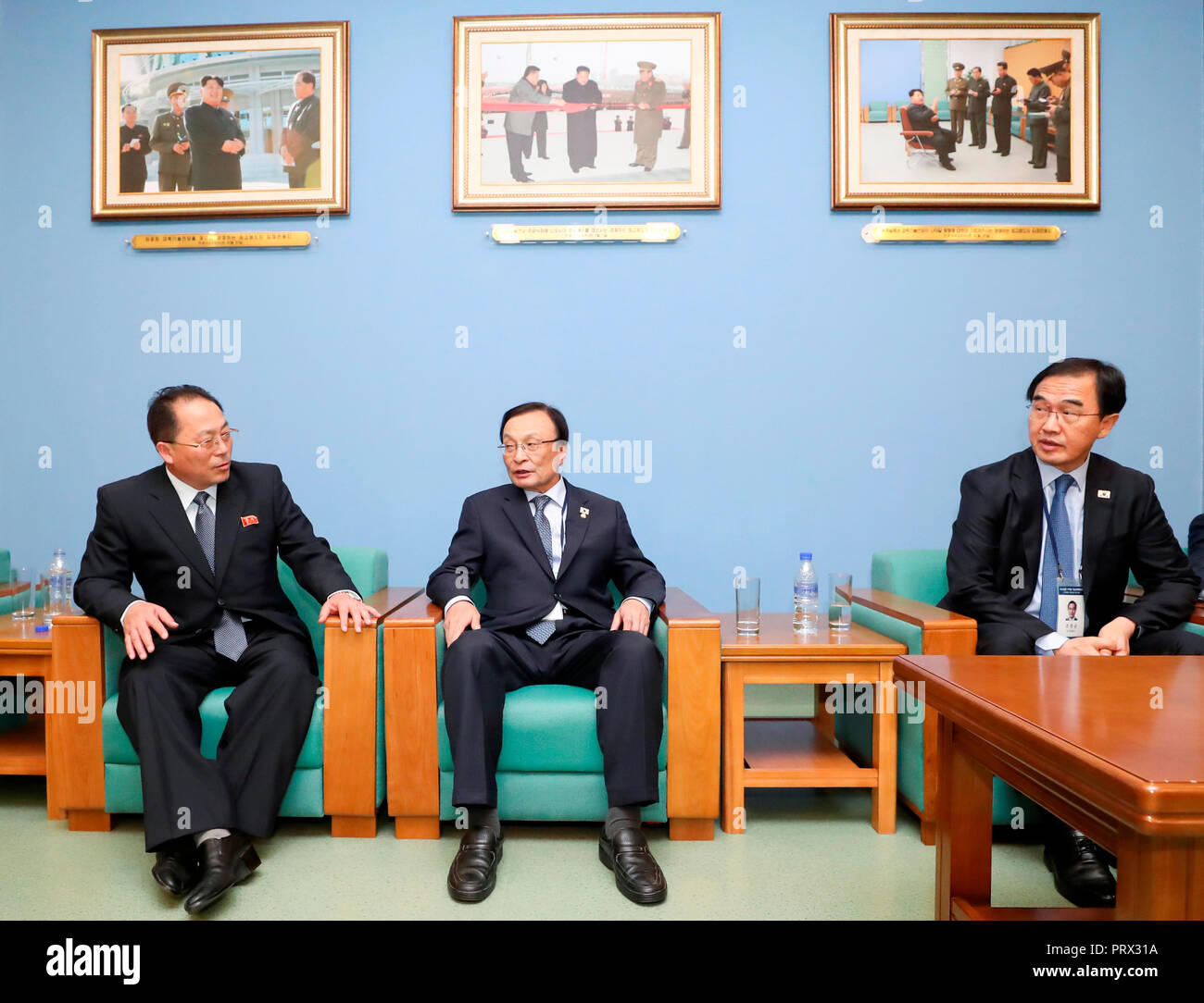 Anniversary of the 2007 inter-Korean summit, Oct 4, 2018 : Vice chairman of the (North Korean) Committee for the Peaceful Reunification of the Country, Jon Jong-su (L), South Korean Unification Minister Cho Myoung-Gyon (R) and South Korea's ruling Democratic Party leader Lee Hae-Chan talk at the Pyongyang Science and Technology Park in Pyongyang, North Korea in this picture taken by Joint Press Corps Pyeongyang. A group of South Korean government officials, politicians and civic and religious leaders are visiting Pyongyang from Oct 4-6 to participate in the first-ever inter-Korean event to cel Stock Photo