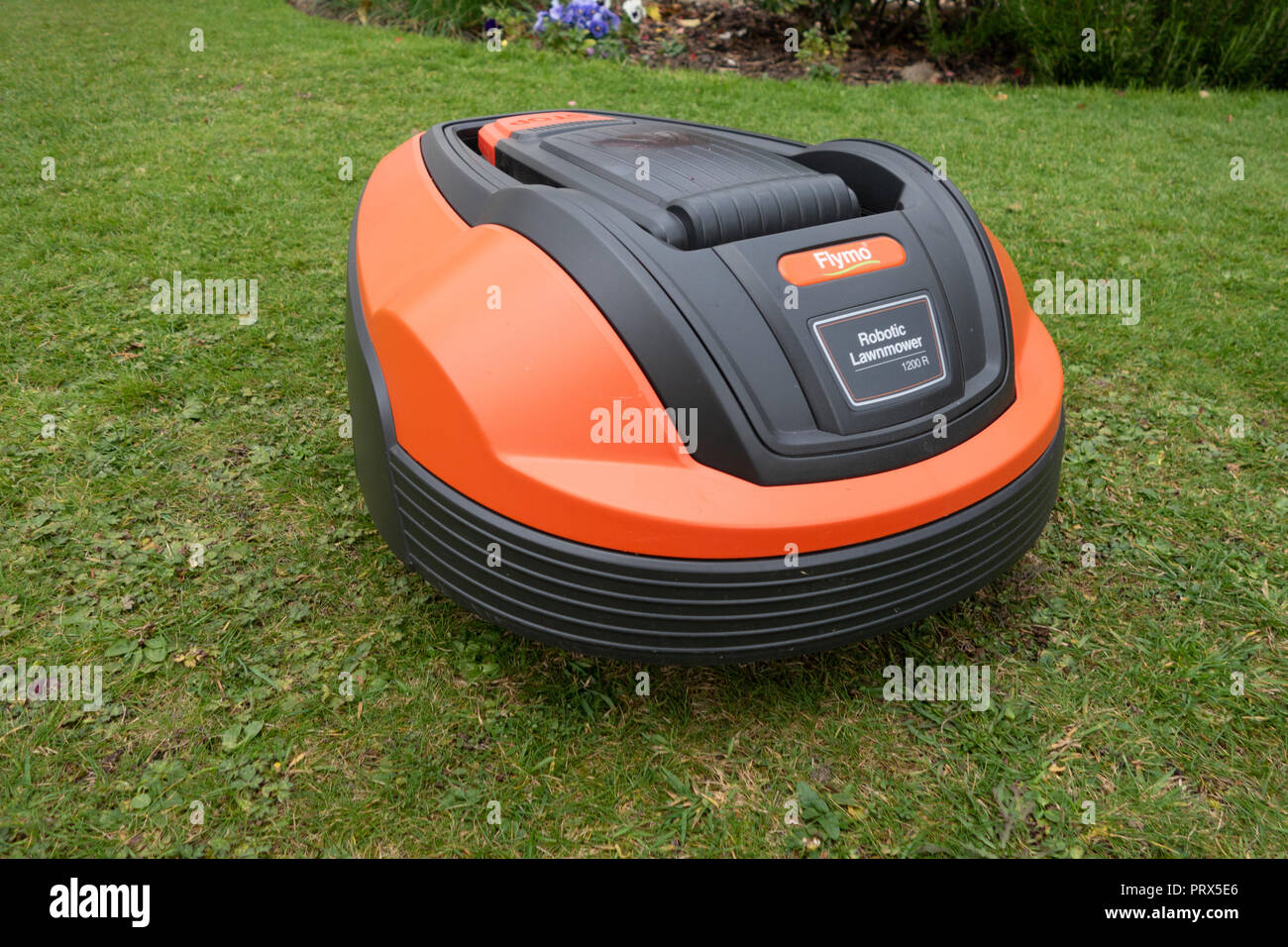 Hi Tech Robot completely Automatic lawn mower Stock Photo - Alamy