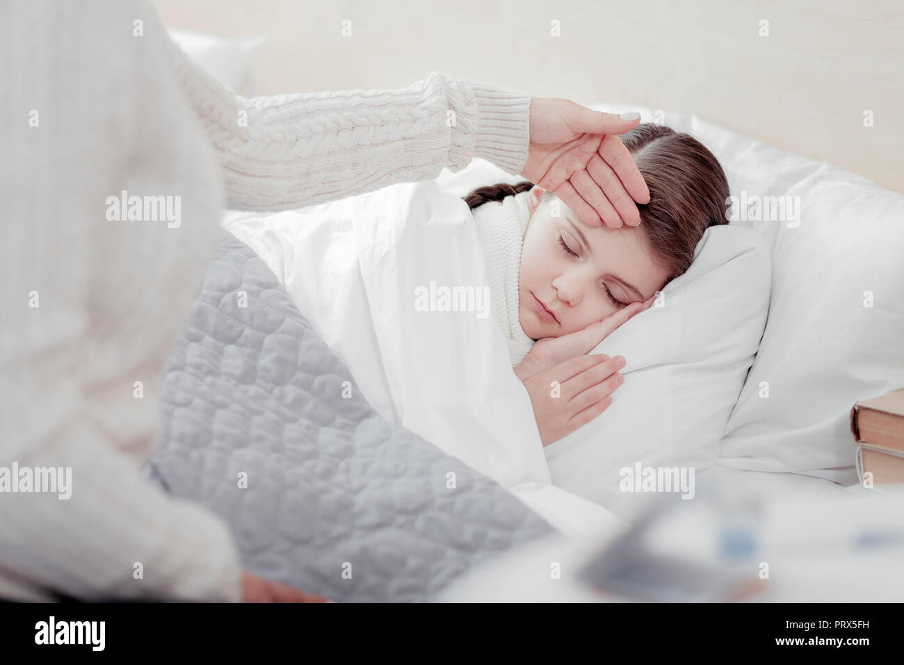 Close up of little girl sleeping in bed Stock Photo - Alamy