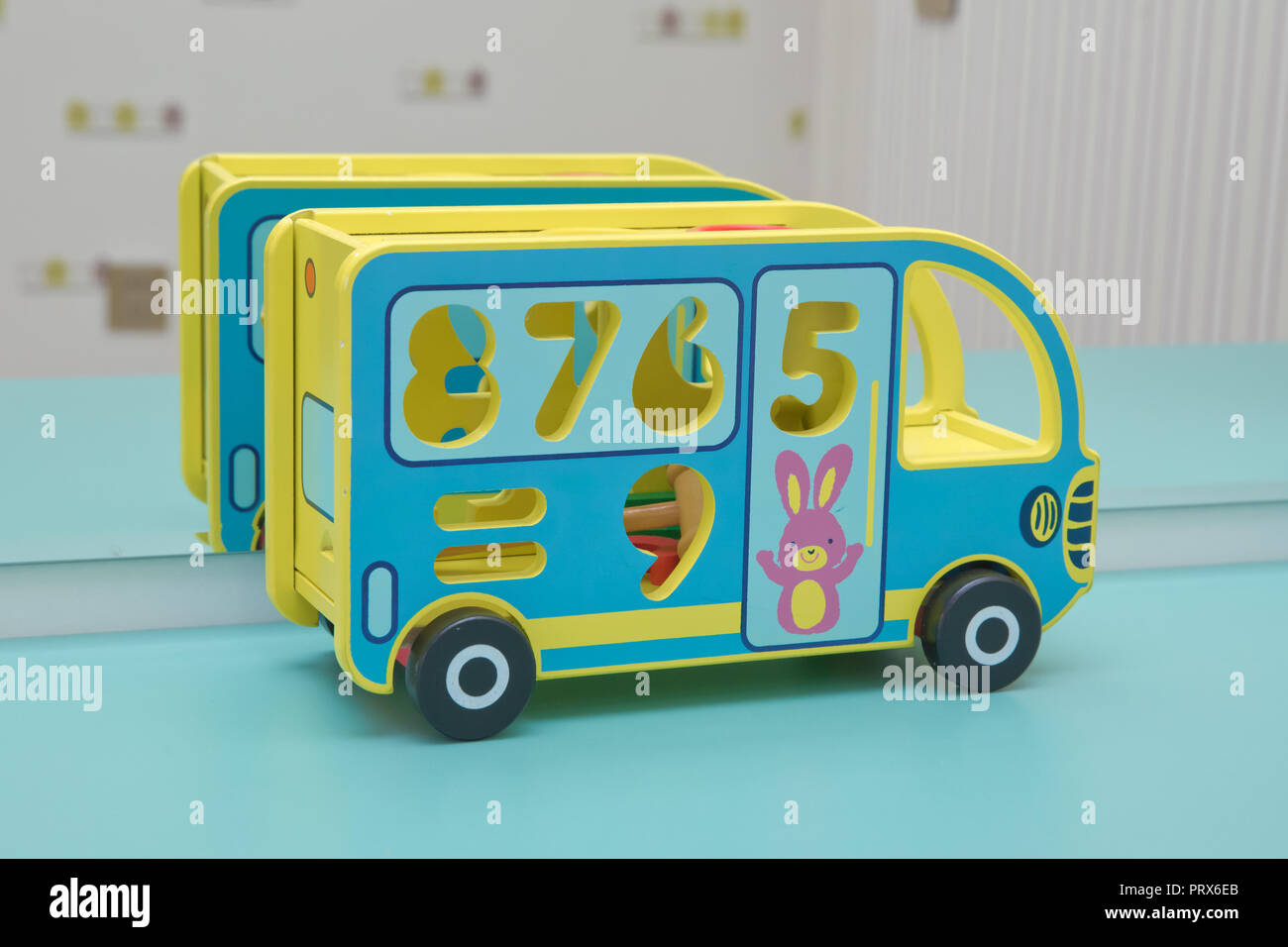 wooden toy bus . toy bus, multicolor car wooden blocks, transport over