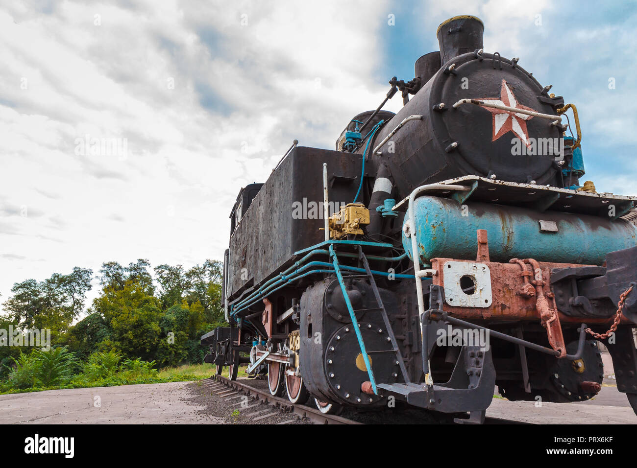 Steam On Rusty Rails Old rusty steam locomotive standing on the rails Stock Photo - Alamy