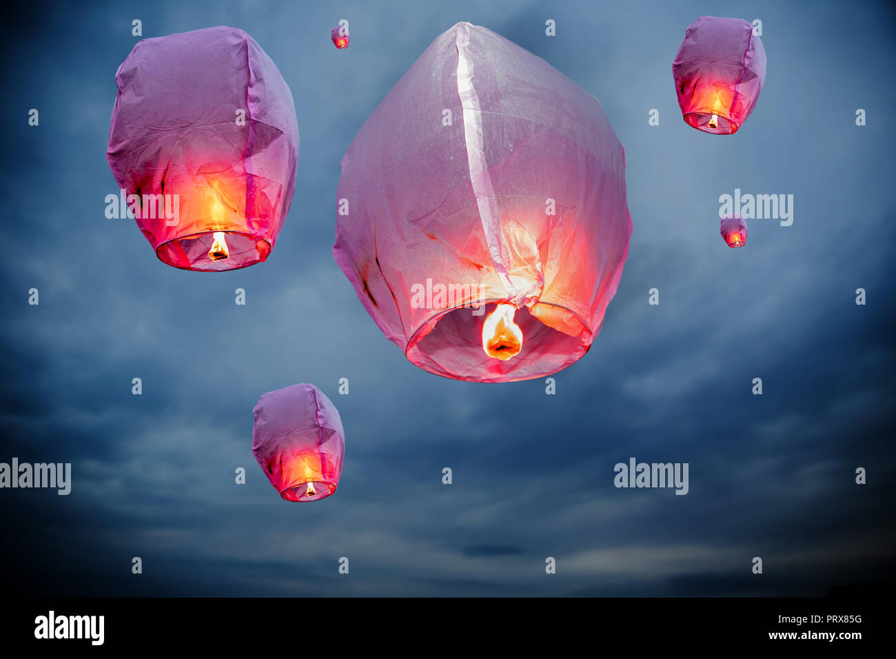 balloon fire flying lanterns, hot-air balloons Lantern flies up highly in  the sky Stock Photo - Alamy