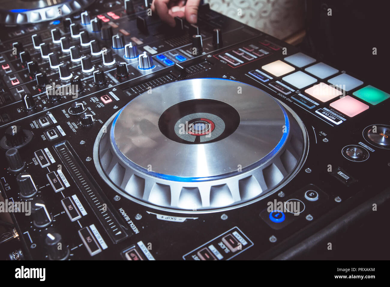 Professional concert dj turntables player device with sound mixer panel and  jog wheel.Club disc jockey stage equipment for playing music on  party.Digital turn table deck for nightclub Stock Photo - Alamy