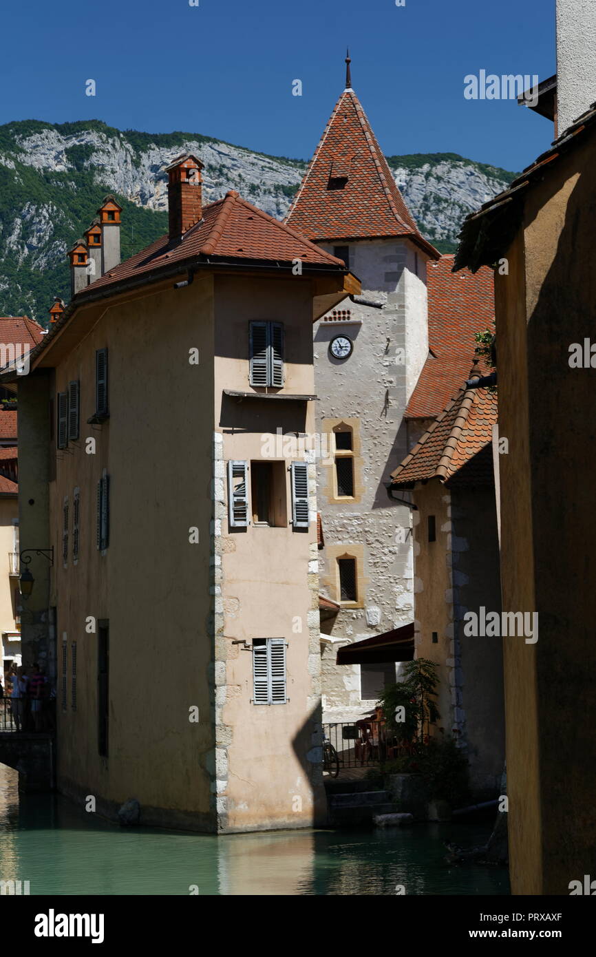View from behind to courtyard of the Palais de I'lle from one of the bridges over the River Thiou Annecy France Stock Photo