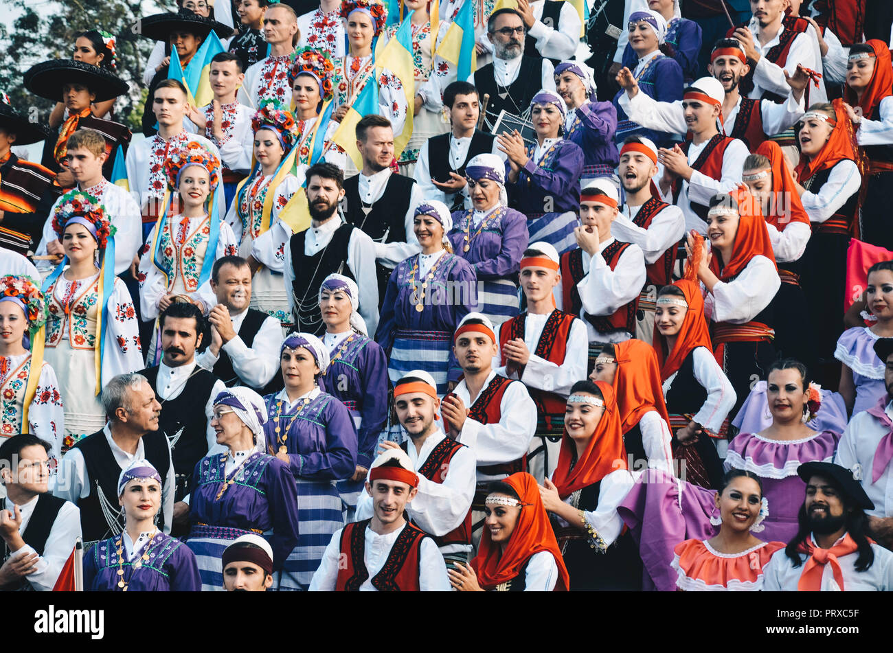 A group of people in traditional regional dress performing in central Skopje, Republic of Macedonia, September 2018 Stock Photo