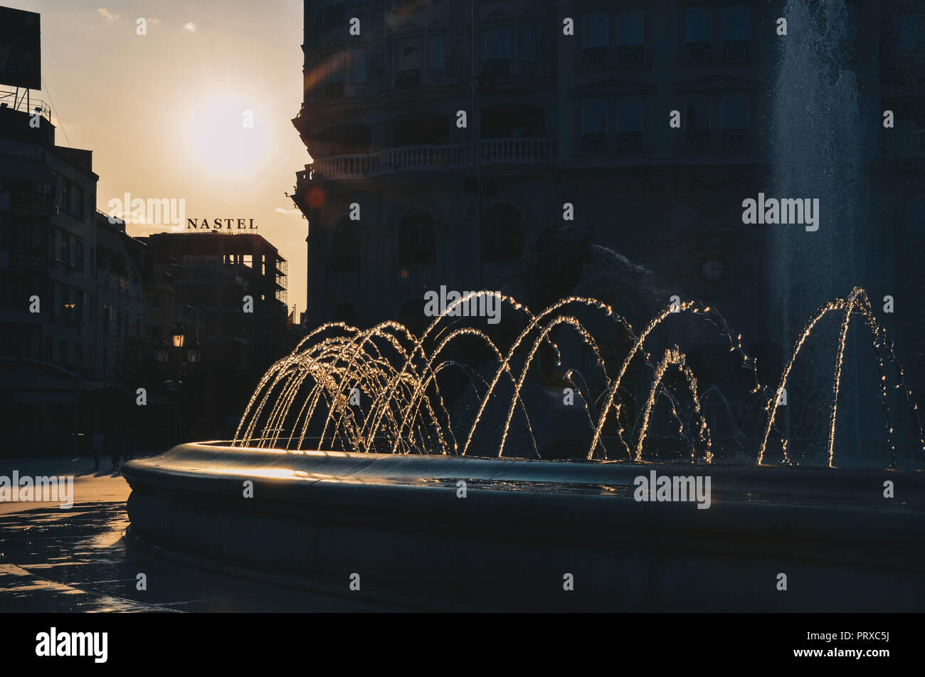 Water fountain at sunset on Macedonia Square, Skopje, Republic of Macedonia, September 2018 Stock Photo