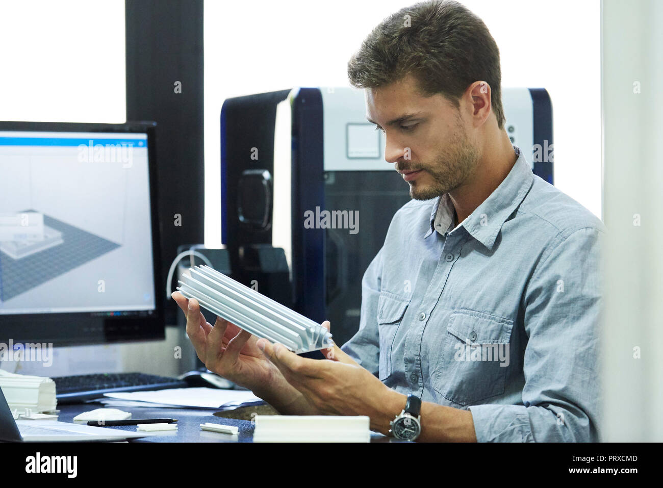Engineer working in office Stock Photo - Alamy