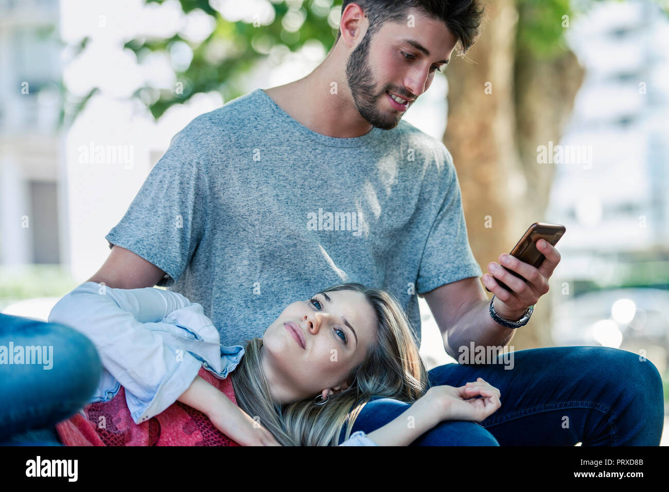Woman sitting on man lap hi-res stock photography and images - Alamy