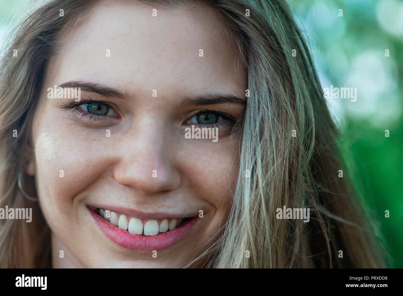 Close-up of young woman Stock Photo - Alamy