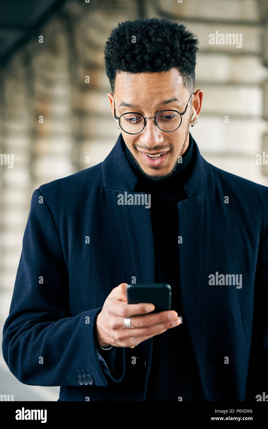 Businessman using smartphone Stock Photo