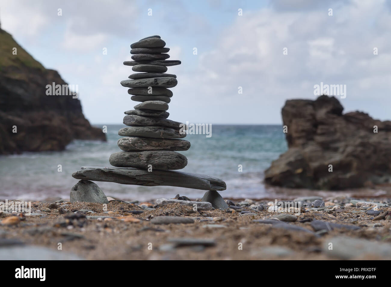 Tower of pebbles on a beach Stock Photo