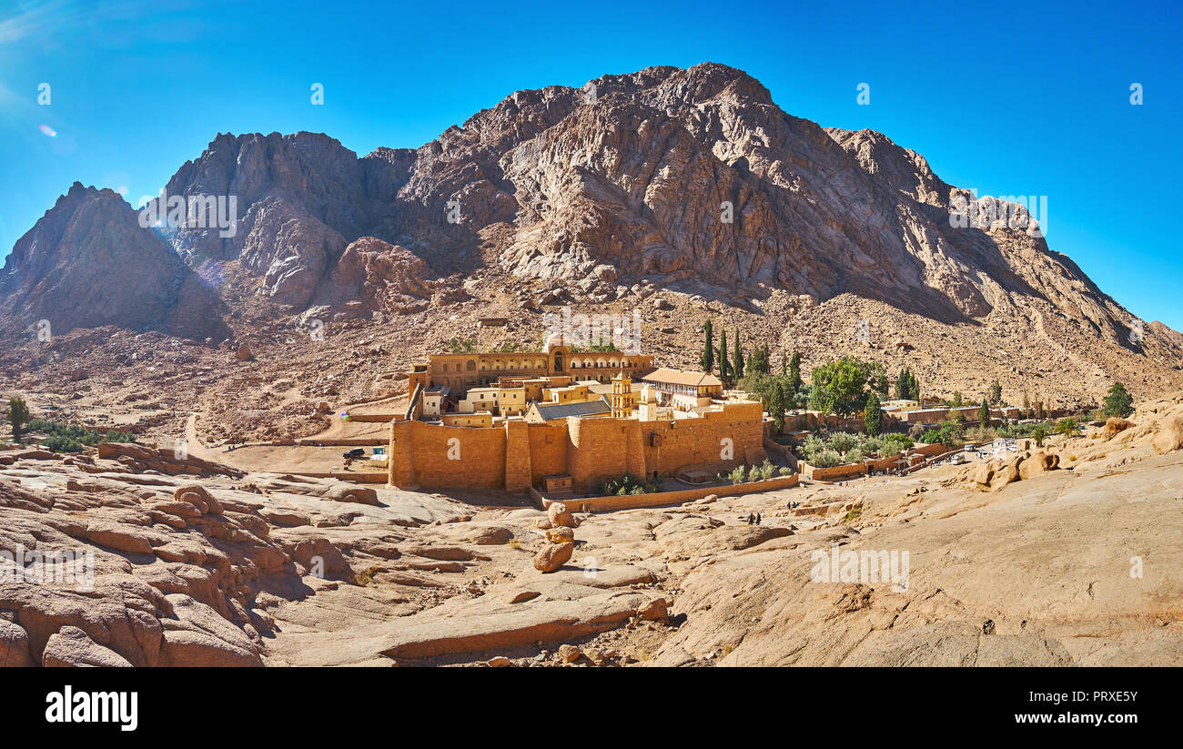 Panorama of the Sacred Monastery of God-Trodden Mount Sinai (St Catherine Monastery), surrounded by huge fortress wall, Sinai, Egypt. Stock Photo