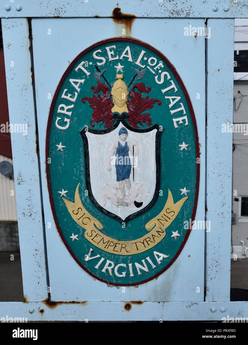 Public art in the form of great seals of the 13 original colonies along with Allegheny County found emblazoned and painted on the 40th Street Bridge Stock Photo