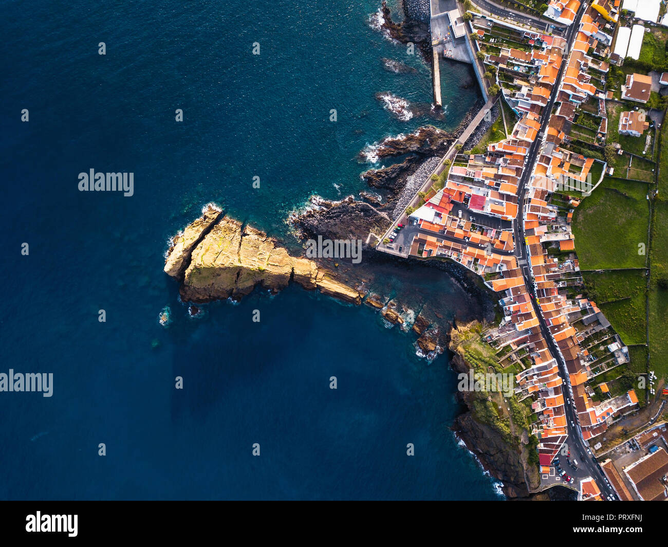 Top view of the ocean surf on the reefs coast of San Miguel island ...