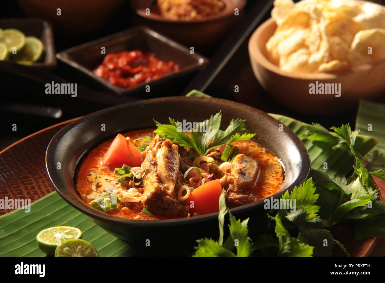 Soto Tangkar. Beef ribs and coconut milk soup from Betawi, Jakara Stock Photo