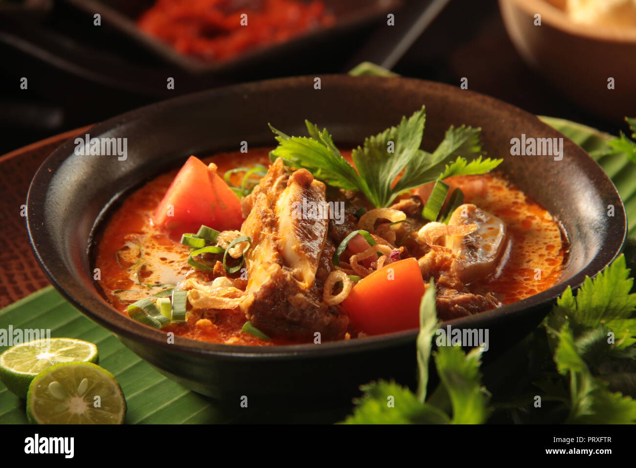 Soto Tangkar. Beef ribs and coconut milk soup from Betawi, Jakara Stock Photo