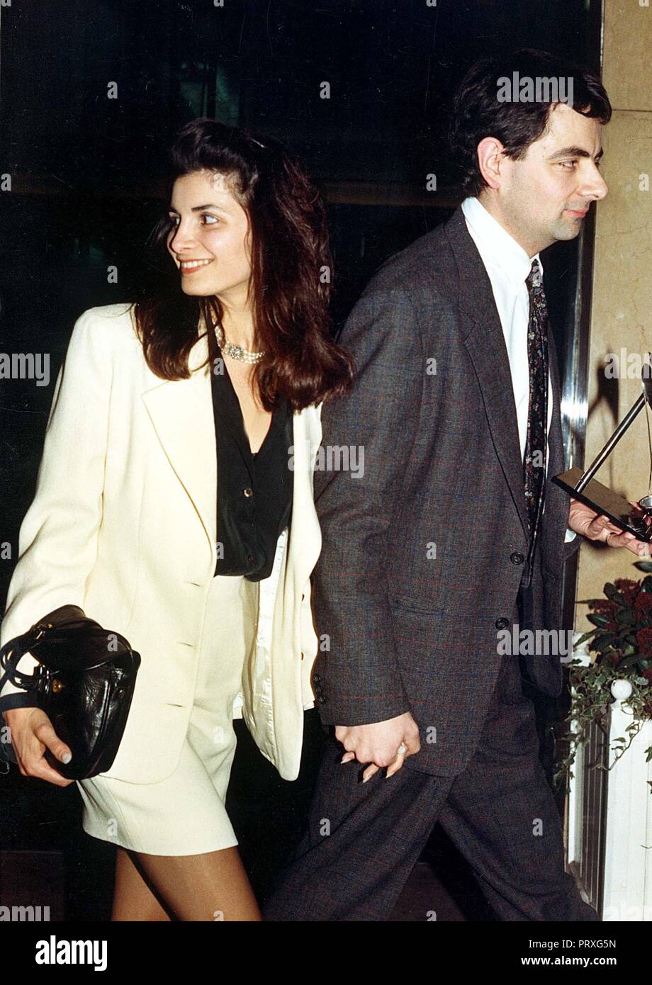 Rowan Atkinson and his wife Sunetra Sastry. The couple have been married  since 1990 and have