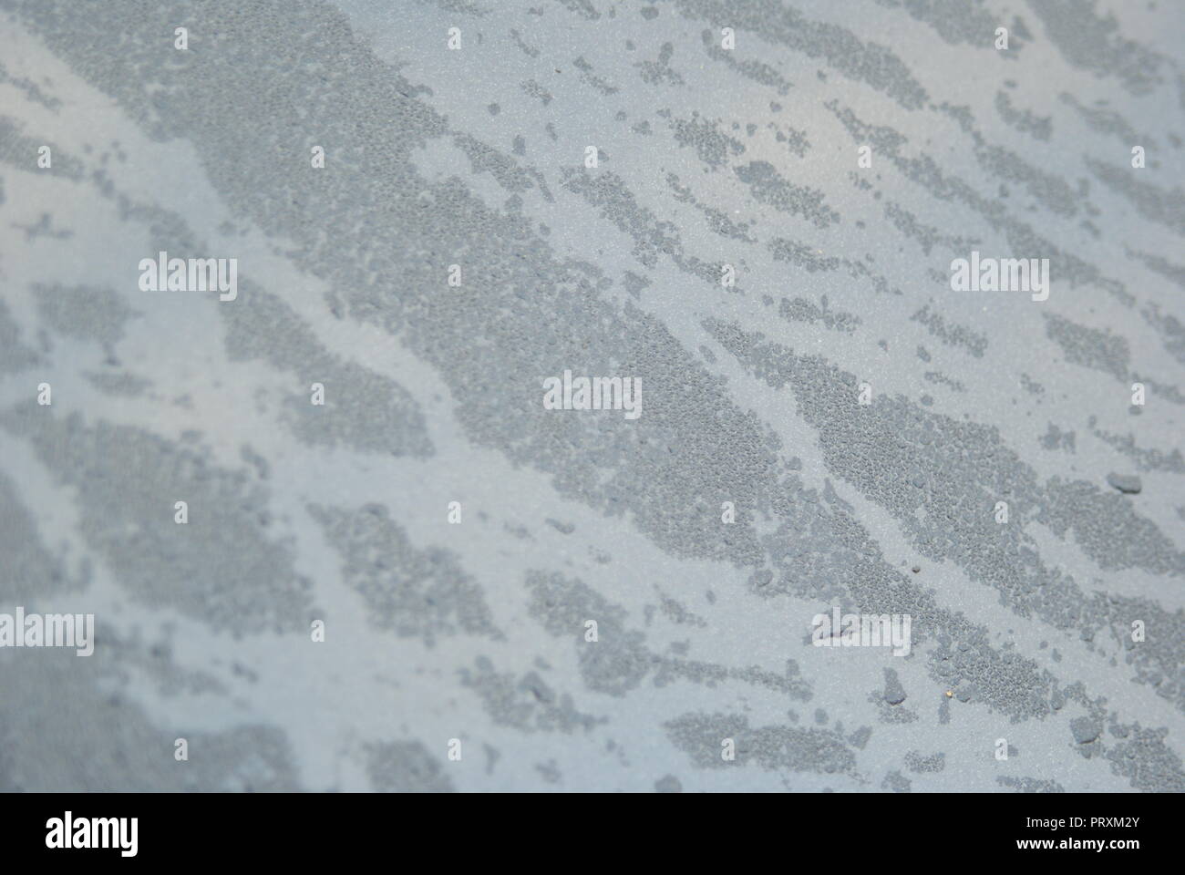 first class car polish after rain on black colored car Stock Photo