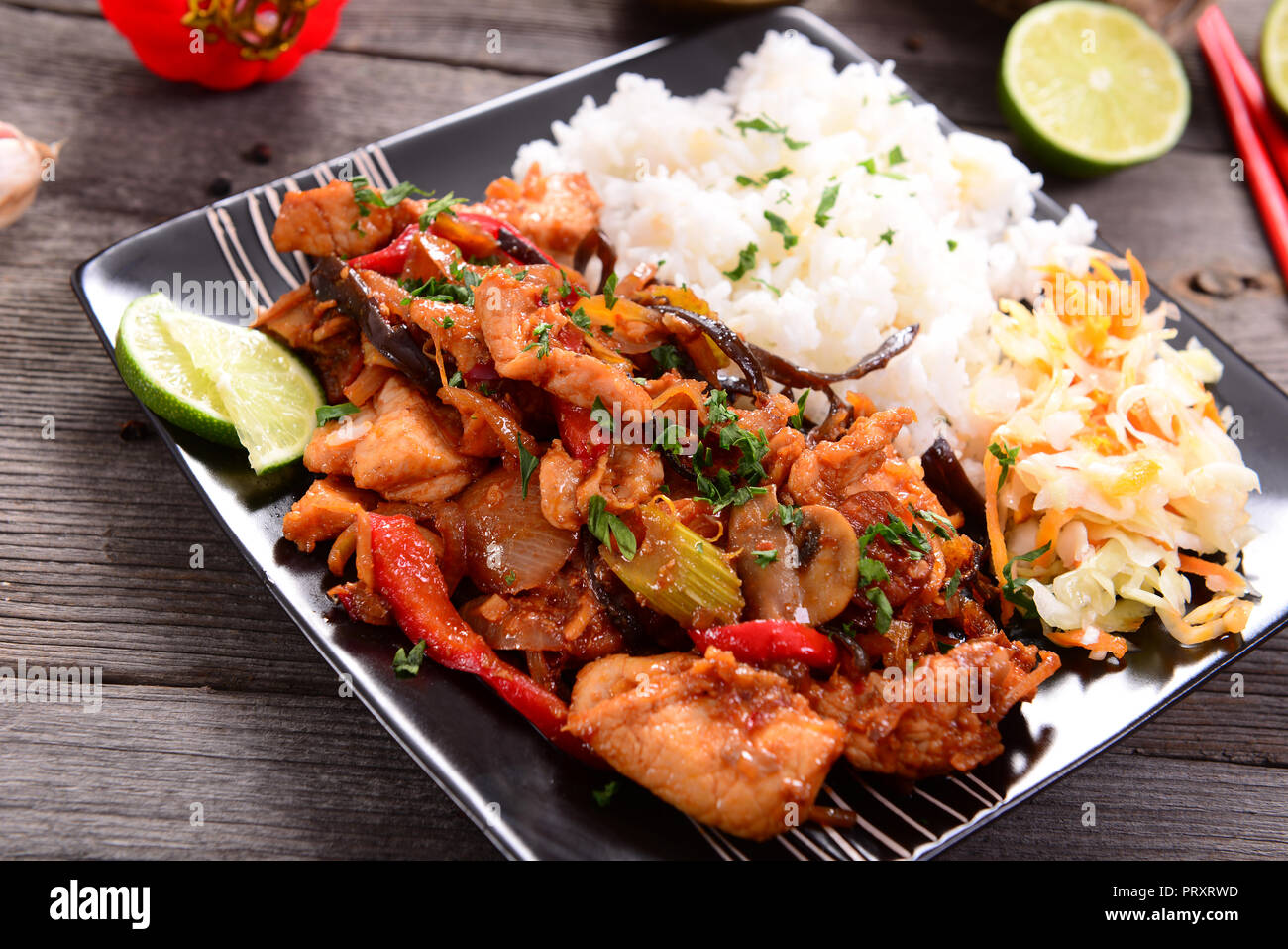 Oriental dish - rice with chicken Stock Photo - Alamy