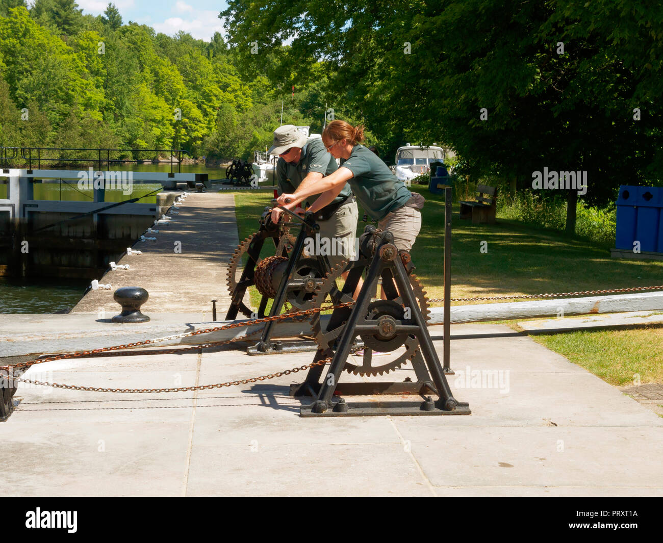 Lock keepers operate the locks by hand on the Rideau Canal, Ontario, Canada Stock Photo
